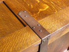 Close-up of hand-hammered hasp hardware.